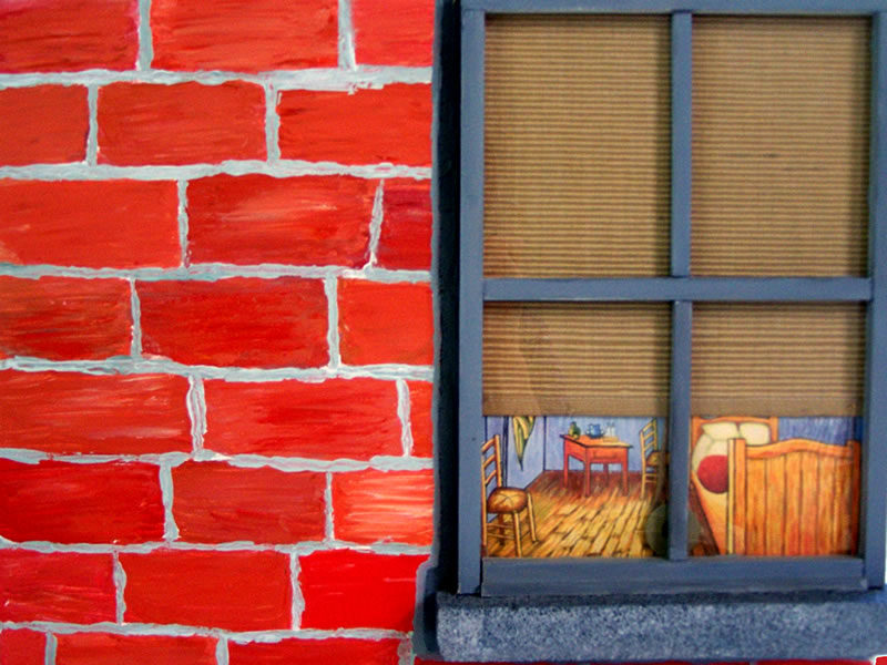 Mixed media of window in brick building